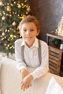 Happy child on Christmas, enjoying some quality time, opening presents, kids on Christmas eve in decorated home