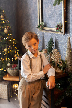 Happy child on Christmas, enjoying some quality time, opening presents, kids on Christmas eve in decorated home