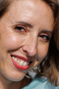 Warm smile graces this woman's face