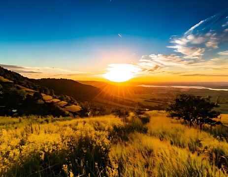 Breathtaking sunset view over a grassy mountain hillside landscape.