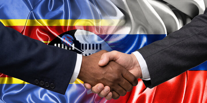 Handshake between Russia and Swaziland, international friendship, background with flags. Flags.