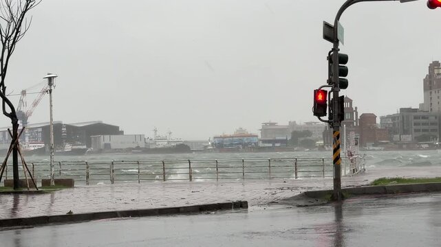 Waves And Sea Spray Drench Urban Waterfront During Hurricane