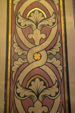 Detail of a painted decorative pilaster with gold fleur-de-lis motifs, Gers, Saint Georges, France