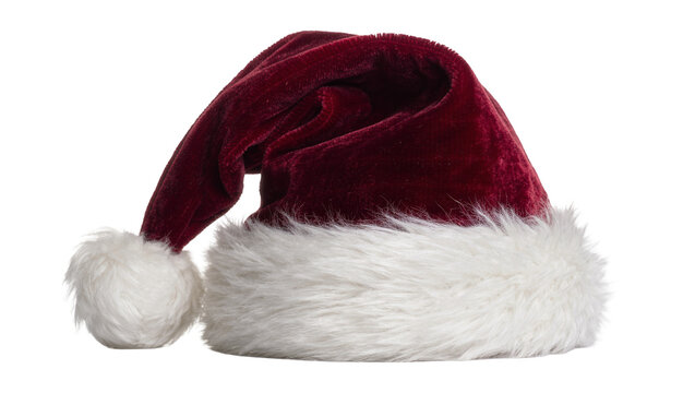 Plush red Santa hat with white fur trim and pompom, isolated on transparent background