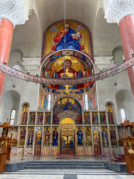 Interior of Saint Mark Church in Belgrade featuring intricate mosaic iconostasis.
