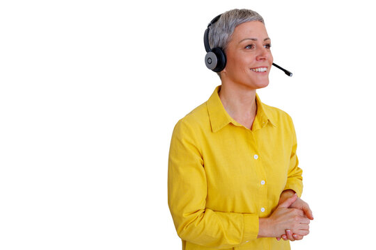 Mature woman wearing headset, smiling, providing customer service and technical support on transparent background