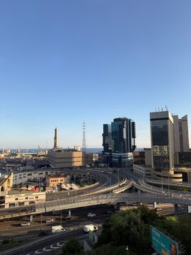 24 April 2026, Italy, Liguria, Genoa, Sampierdarena - hotel outlook of World Trade Center Lighthouse and highway SS1 E25 main road
