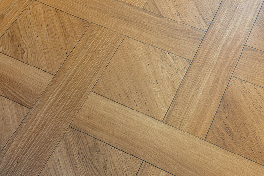 Wooden floor with parquet pattern
