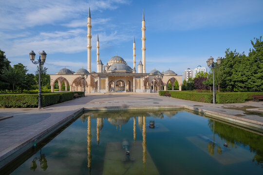 The Heart of Chechnya mosque with a reflection on a sunny June morning. Grozny, Chechen Republic