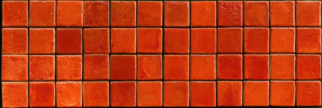 The image showcases a grid of terracotta tiles with warm glaze variation, featuring an artisanal pattern suitable for design projects.