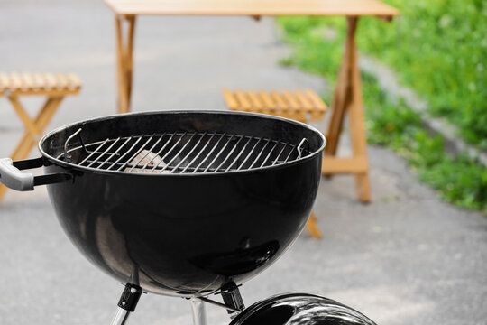Modern brazier in forest, closeup