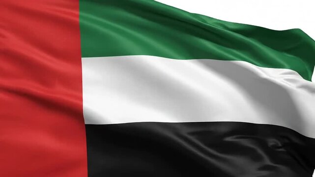 Close-up shot of the United Arab Emirates national flag waving in full frame