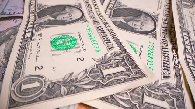 Stimulus economic tax return check and USA currency hundred US dollar bills 1040 U.S. Individual Income Tax Return