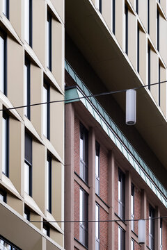 Contemporary facade detail in Oslo Norway shows layered residential and urban architecture with clean lines windows and muted colors