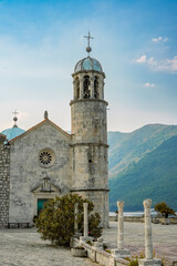 Obraz premium Our Lady of the Rocks church and historic bell tower