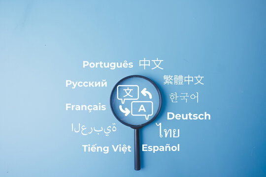 Magnifying glass with a translation icon and various language words on a blue background. Concept of multilingual communication, language learning, global localization, and translation service.