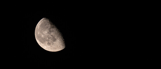 Waning gibbous moon and craters at night © Banu Sevim