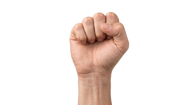 Close-up of a clenched fist raised in a gesture of strength and determination