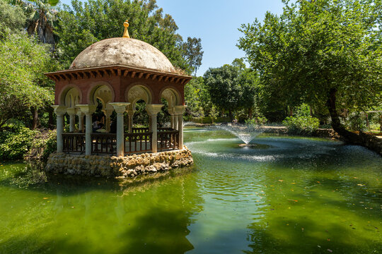 Pavilion of Alfonso XII on Duck Island beside a fountain in Maria Luisa Park, Sevilla, Spain