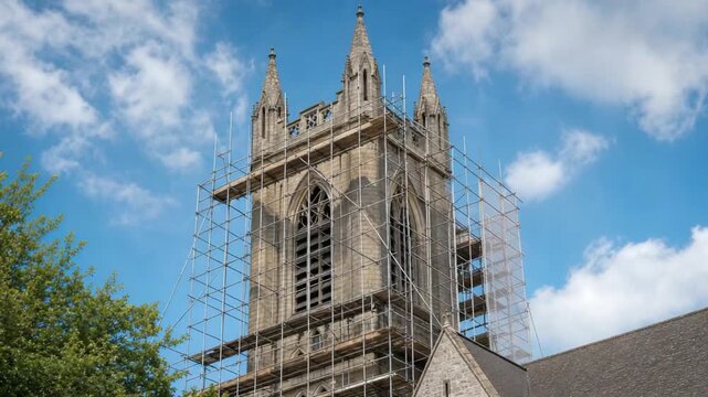 Renovation of a church bell tower. With scaffolding.