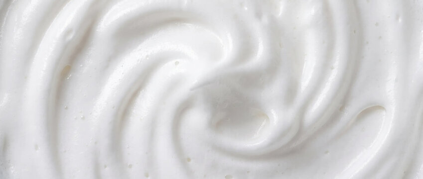 Meringue peaks whipped egg white texture. Sweet dessert cream background
