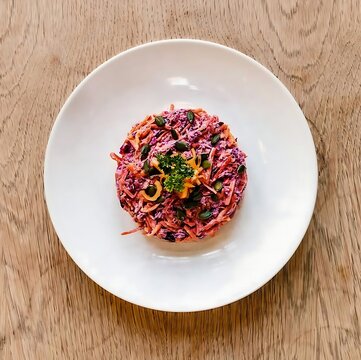 Red cabbage coleslaw with herbs and capers on a white plate cabbage salad plated salad side dish