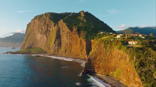 Aerial view of Madeira cliffs coastline landscape on sunrise, Guindaste viewpoint, Madeira Island, Portugal