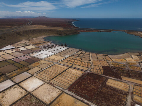 Aerial view shows Salinas de Janubio salt flats in Lanzarote Spain