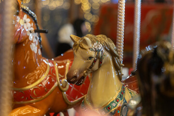 Ornate Carousel Horses Under Festive Evening Lights © Emanuel