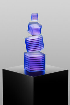 Translucent quantum data cubes balance on a black pedestal