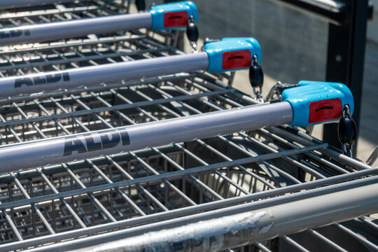ALDI shopping carts at a supermarket entrance