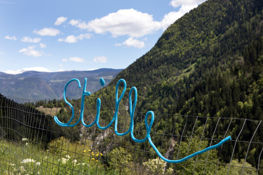 Italy, Trentino-Alto Adige, St. Pankraz, word Stille in alpine landscape