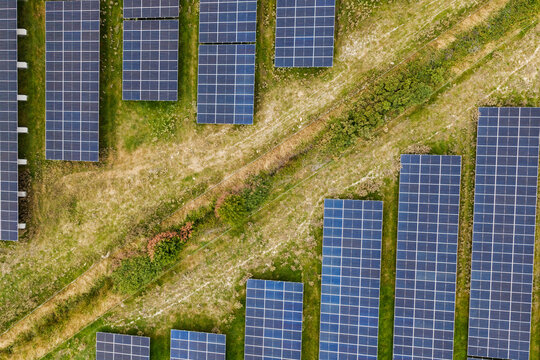 A solar park generates clean energy in a green field in Ireland