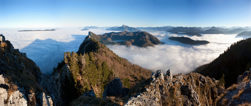 Austria, Salzkammergut, View of alpine foothills covered with fog