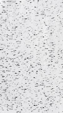 Heather gray fabric texture with black specks, speckled knit textile background