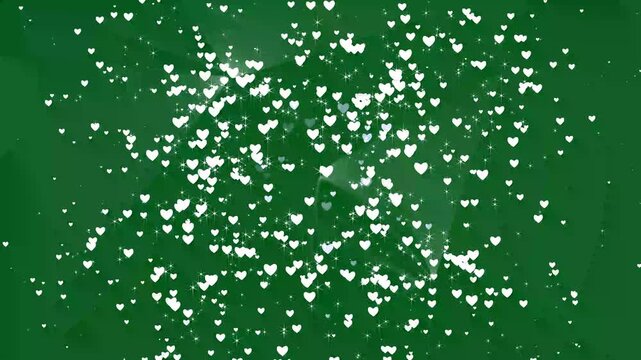 4k Particle glitter glow heart and star background loop. white shining heart shaped glitter on green backgrounds. valentine day, mother day, love and marriage concept, particle glow seamless loop