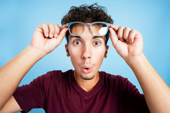 Young man realizing something important with shock