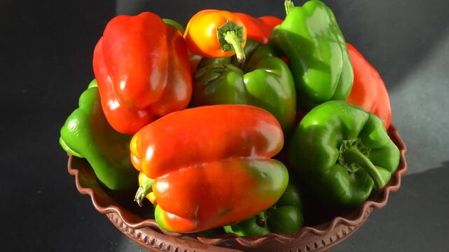 Sweet pepper food. Fresh Bell Peppers Red Orange Green color Vegetables bowl.