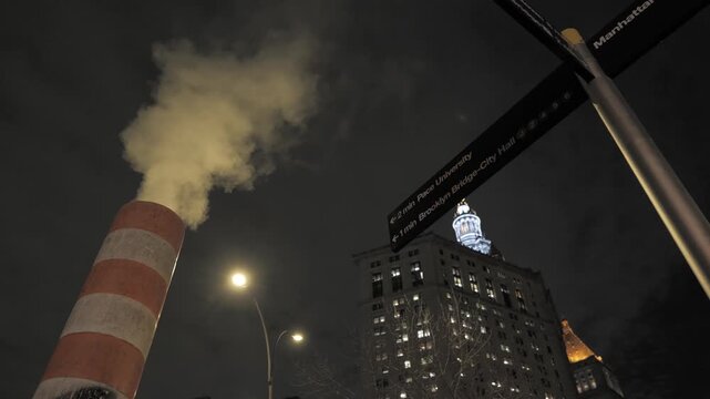 Night Street View in New York City with Steam Pipe and Skyscrapers 4K