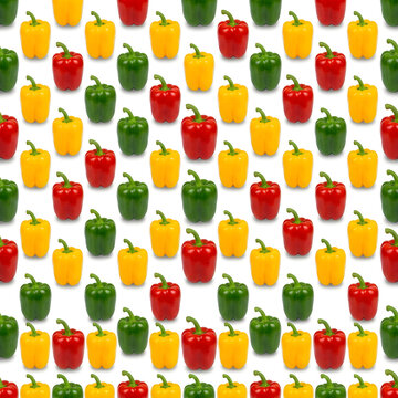 Grid arrangement pattern of shiny red, yellow and green bell peppers isolated on white background, fresh sweet paprika vegetable pattern layout