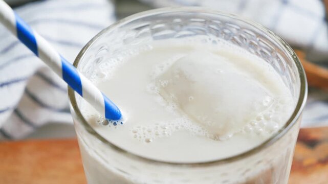 Traditional Spanish cold non-alcoholic drink from the Valencian Community, made from crushed chufa tubers (ground almonds), water and sugar. High quality 4k footage