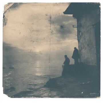 A vintage-inspired monochromatic image with heavy film grain, visual noise and distressed texture. The blurred sepia tones evoke an atmospheric 1980s analogue aesthetic.
