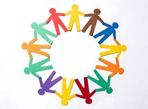 Colorful paper cut out people holding hands in unity circle formation