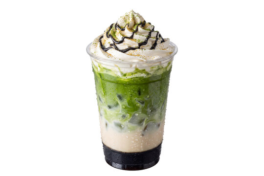 Layered matcha green tea and black sesame iced latte with whipped cream in plastic cup