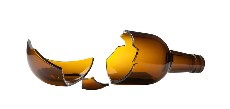 A broken glass bottle with a dark amber hue and sharp jagged edges lying on a plain surface isolated on transparent background