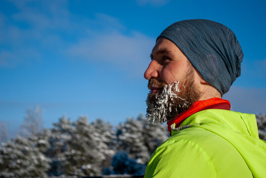Determined winter runner after endurance workout in subzero weather