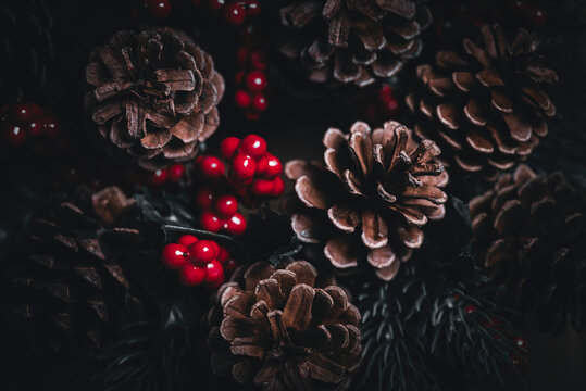 Christmas postcard background wreath pine cone tree. Merry Christmas and Happy new year greeting card. Coniferous berry texture decoration with white snow. 2027 New year eve poster wallpaper banner.