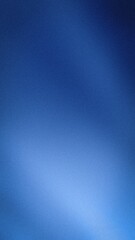 Fototapeta premium Blue gradient textured background with grainy blur effect for vertical tech wallpaper and design template