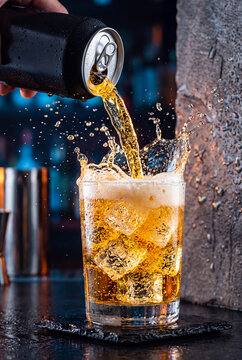 Cold energy soda drink pouring with fizzy bubbles 