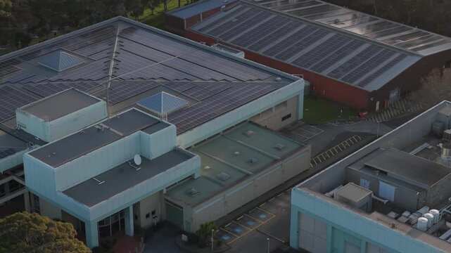 Melbourne, VIC, Australia - 03 September 2026: Aerial view of Knox Data Centre featuring extensive rooftop solar panels on industrial buildings.
